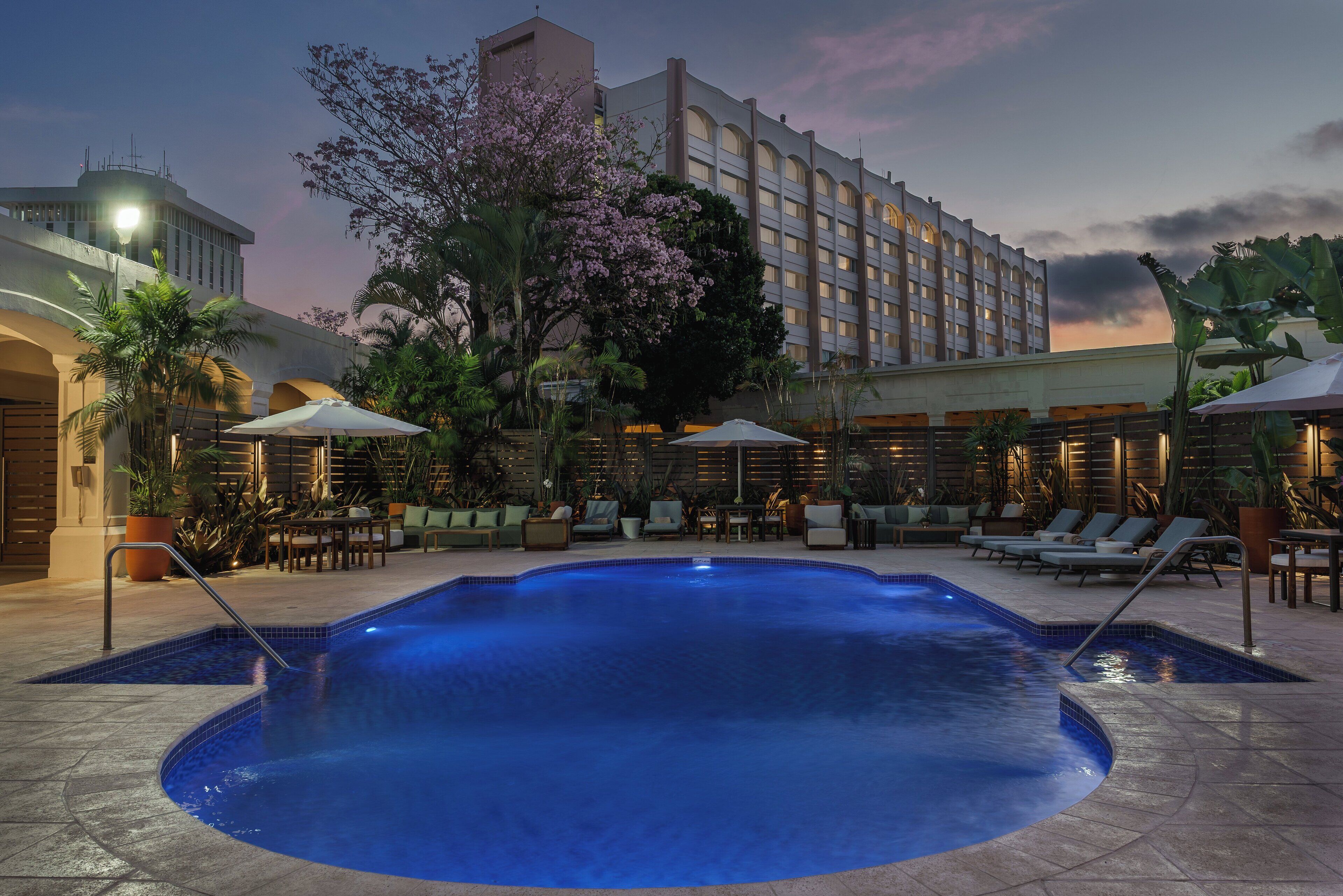 outdoor pool, open 6:30 am to 10:00 pm, pool umbrellas, pool loungers