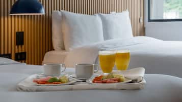 Premium bedding, down duvets, in-room safe, desk