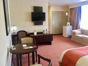 Suite, 1 King Bed, Non Smoking | Premium bedding, down duvets, in-room safe, desk