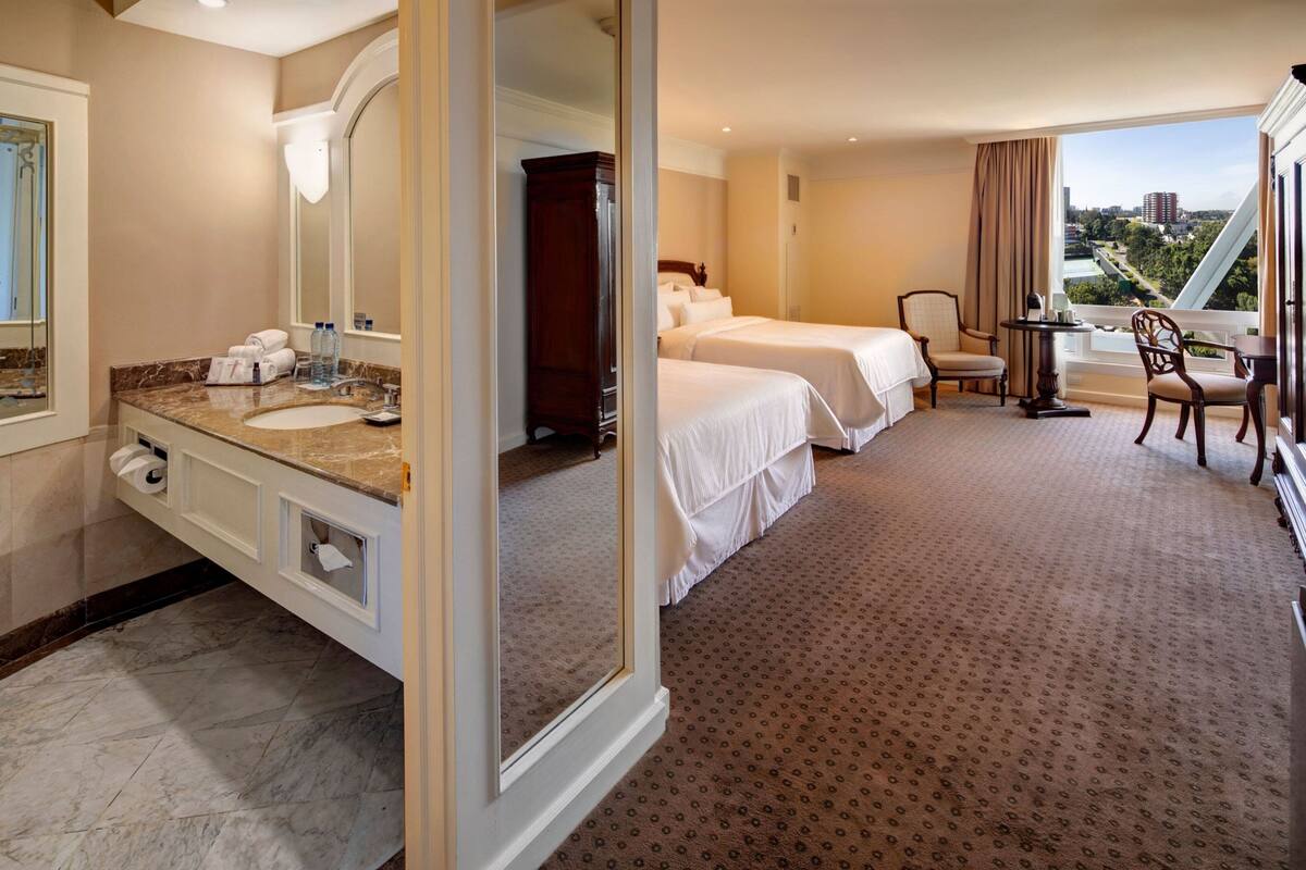 deluxe room, 2 queen beds | egyptian cotton sheets, premium bedding, pillow-top beds, minibar