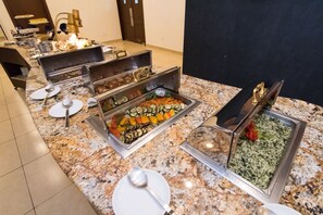 Breakfast, lunch, dinner served; international cuisine, pool views