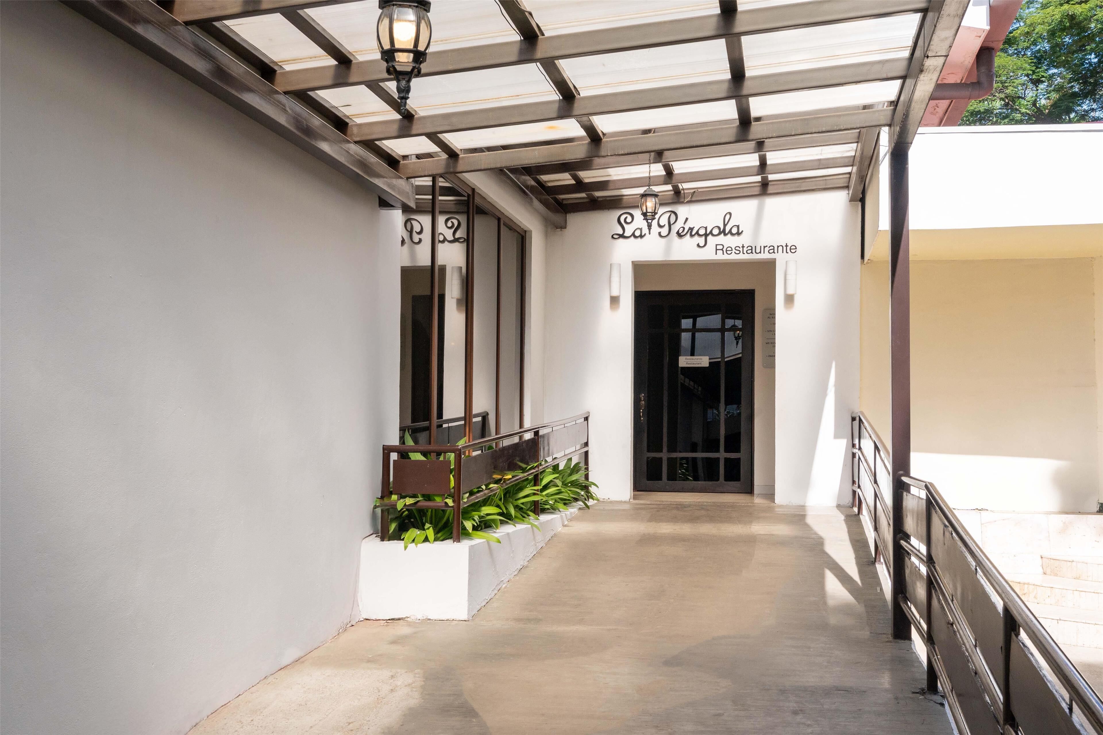 Breakfast, lunch, dinner served; international cuisine, pool views 