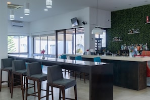 Pool views, serves dinner, brunch and happy hour