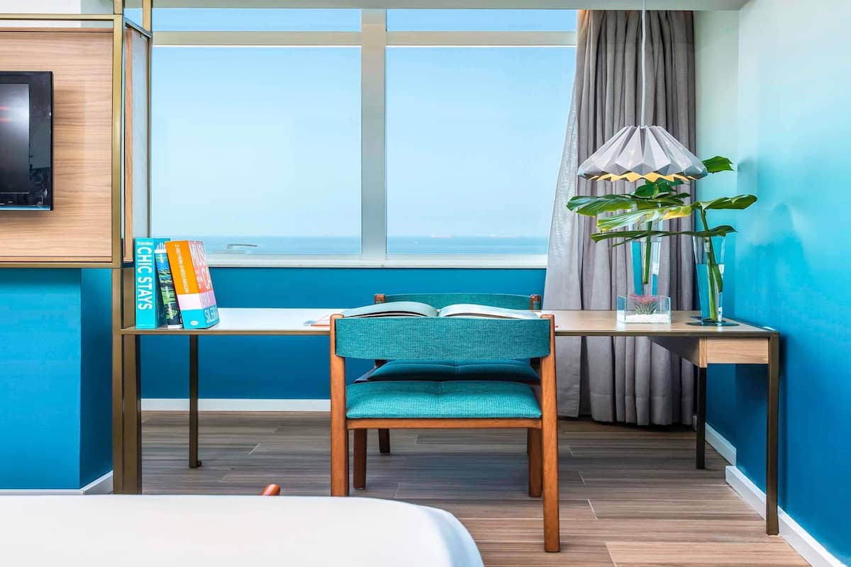 Deluxe Room, 1 Double Bed, Oceanfront | Minibar, in-room safe, individually decorated, individually furnished