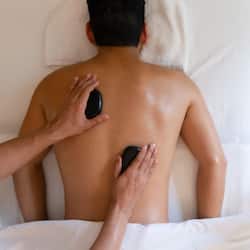 Experience a rejuvenating back massage in a serene, space with expert hands.