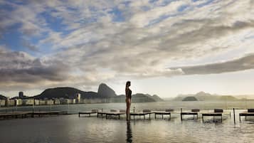 2 outdoor pools, open 7:00 AM to 6:00 PM, pool umbrellas, pool loungers