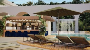 A pool area with lounge chairs, a waterfall feature, and a covered seating area with woven chairs. - Tropical Hotel da Amazonia, a Tribute Portfolio Hotel (Manaus)