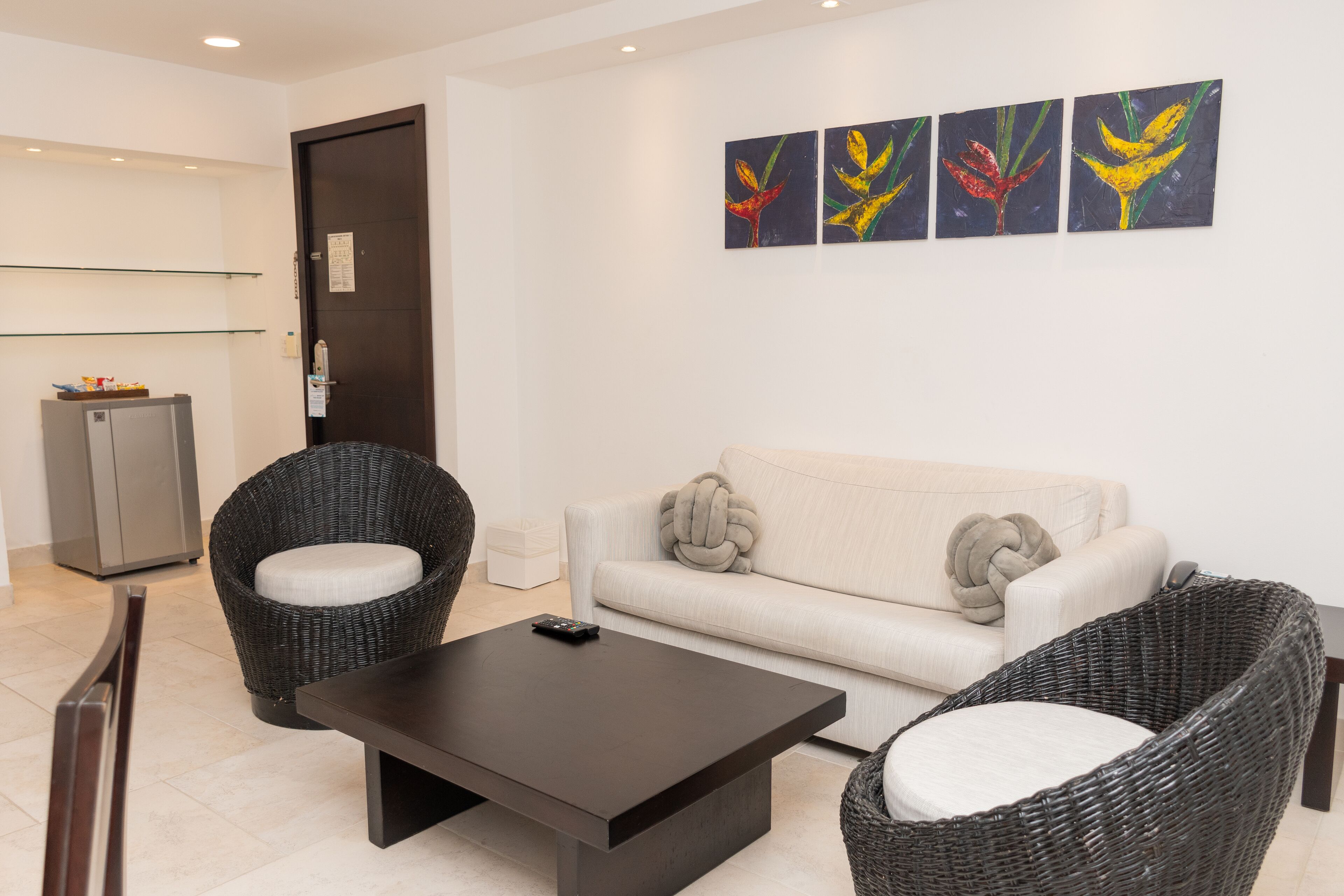 junior suite, balcony, ocean view | living room | 42-inch tv with cable channels