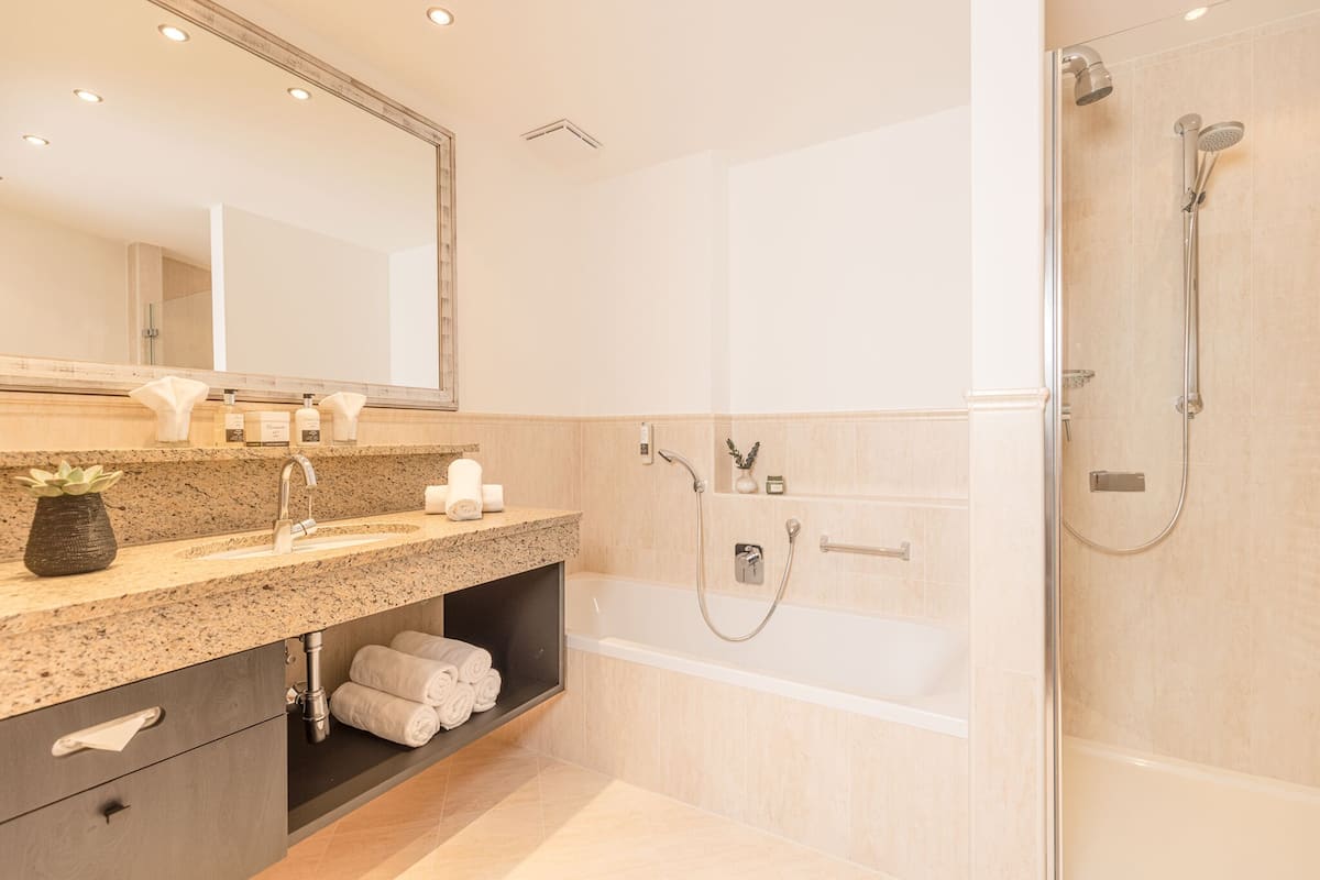 superior double room, balcony, mountain view (sonnjoch) | bathroom | hair dryer, towels