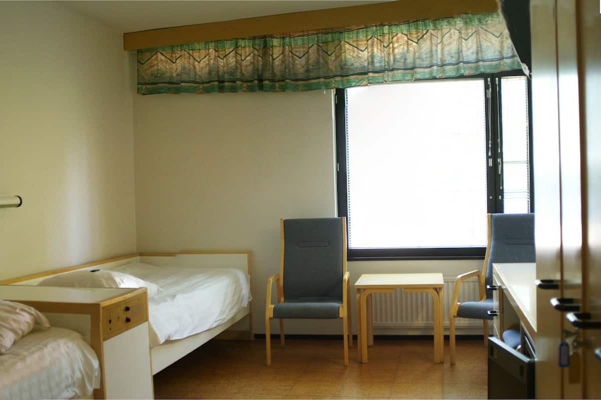 Economy Twin Room | 2 bedrooms, desk, free WiFi, bed sheets