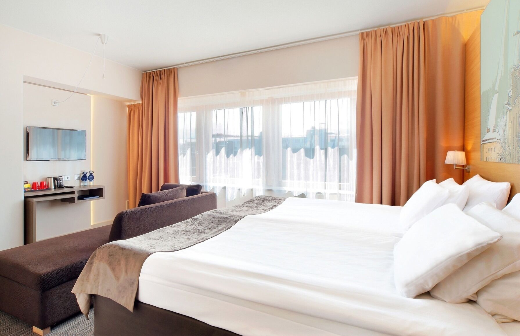 Hypo-allergenic bedding, minibar, in-room safe, desk
