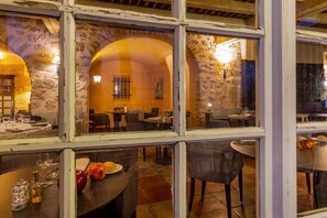 Dinner served, French cuisine, garden views 