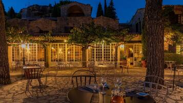 Dinner served, French cuisine, garden views