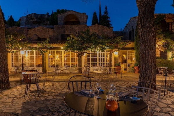 Dinner served, French cuisine, garden views
