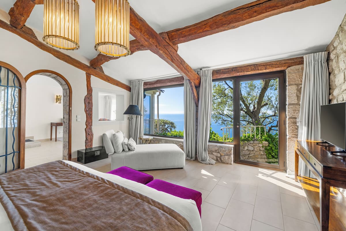 Junior Suite, 1 Bedroom, Sea View | Minibar, in-room safe, soundproofing, iron/ironing board