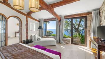 Junior Suite, 1 Bedroom, Sea View | Minibar, in-room safe, soundproofing, iron/ironing board