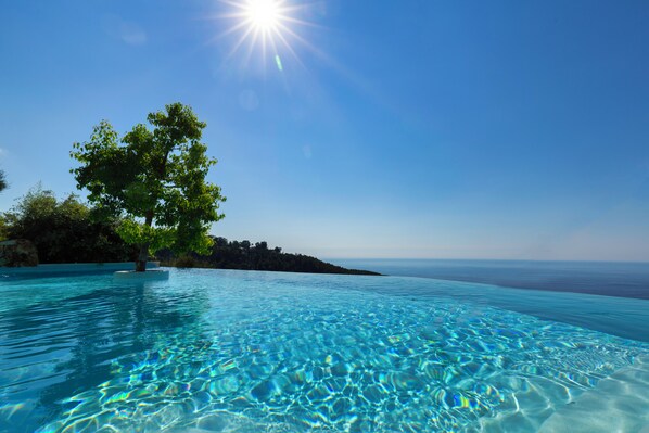 2 outdoor pools, pool umbrellas, sun loungers
