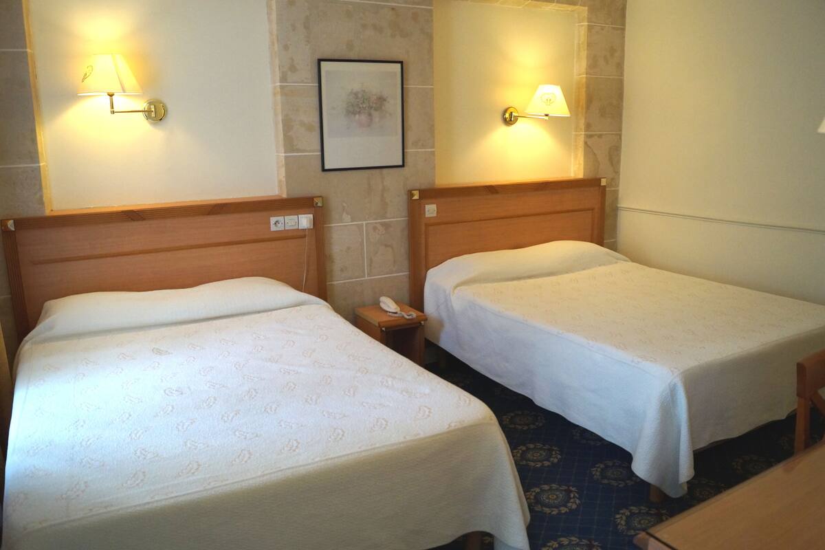 Desk, blackout curtains, soundproofing, free WiFi