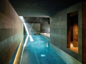 Indoor pool, open 8:00 AM to 8:00 PM, pool loungers