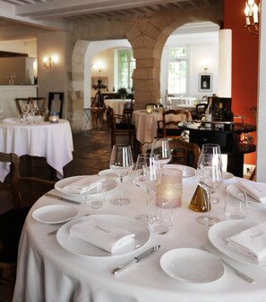 Lunch, dinner served; French cuisine, garden views
