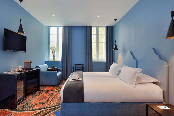 Ropa de cama de alta calidad y minibar