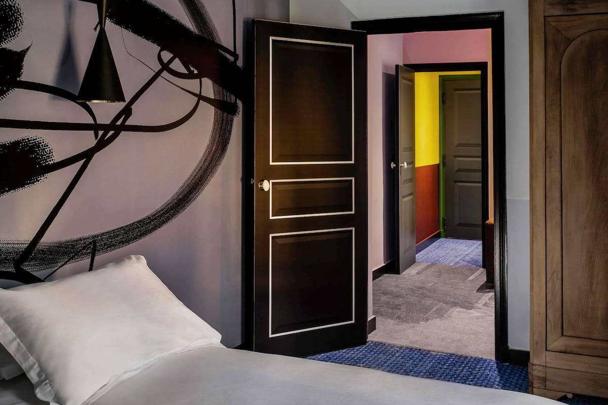 Junior Suite, 1 King Bed | Premium bedding, minibar, in-room safe, individually decorated