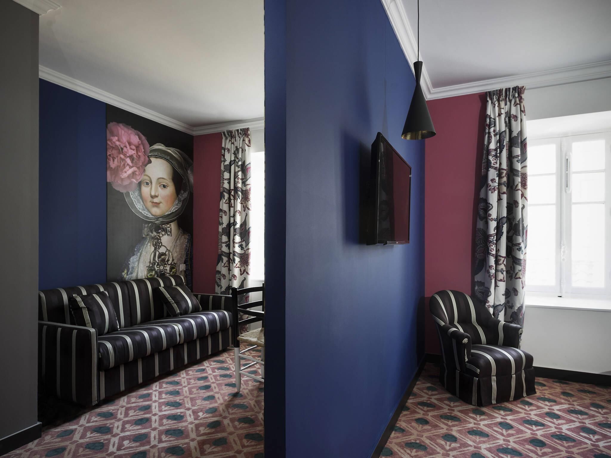 Junior suite, 1 kingsize bed | Luxe beddengoed, een minibar, een kluis op de kamer