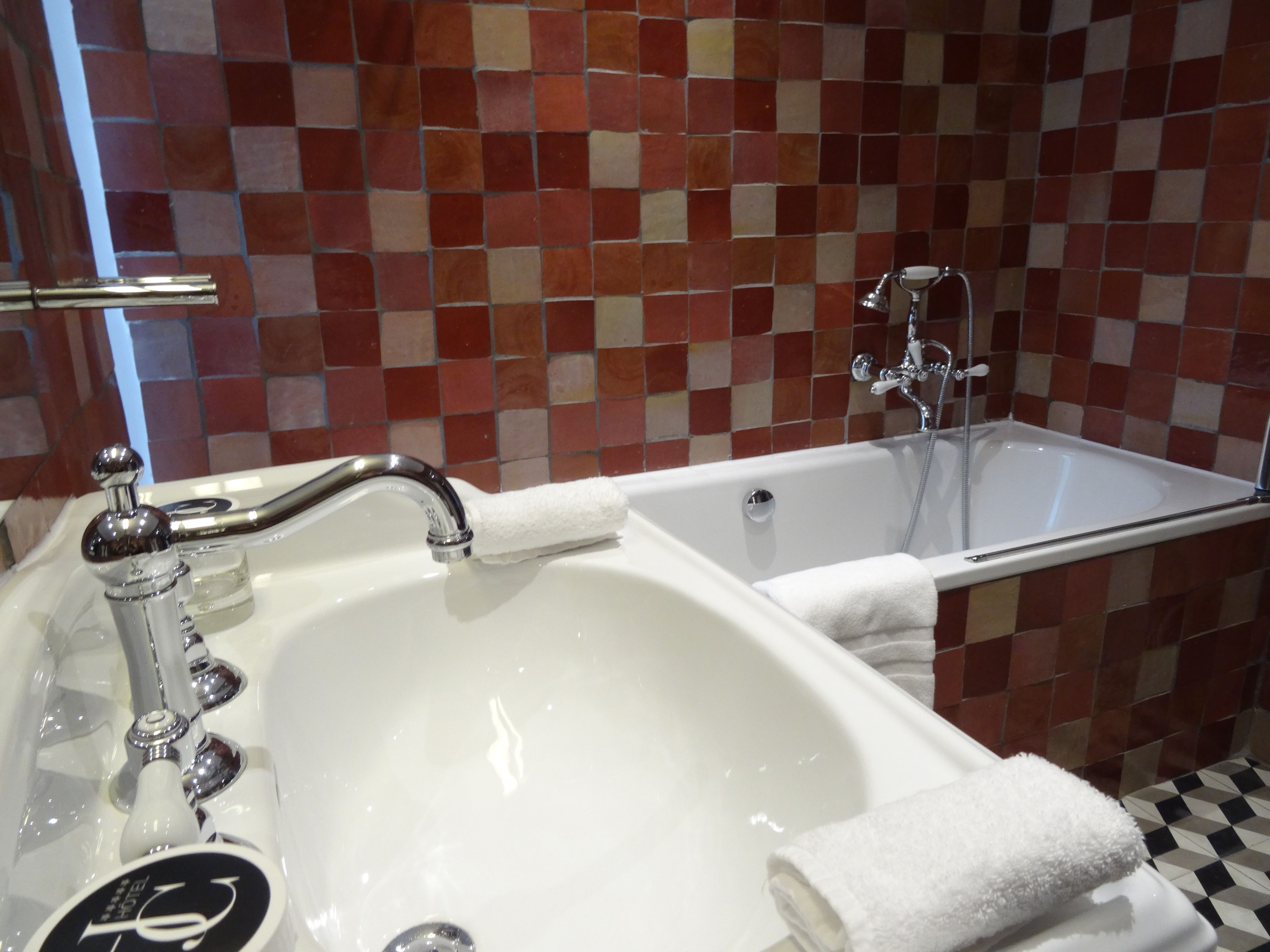 eco-friendly toiletries, hair dryer, bathrobes, slippers