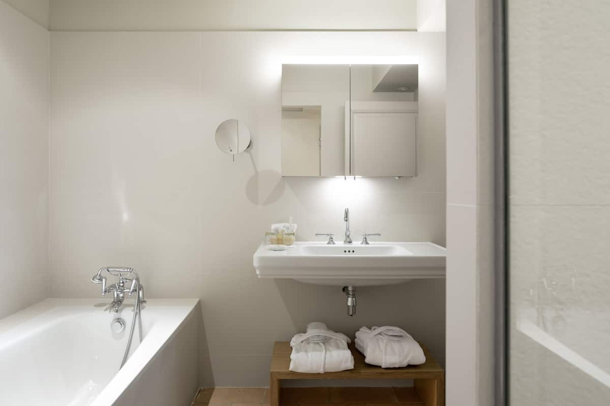 luxury room | bathroom | shower, free toiletries, hair dryer, bathrobes