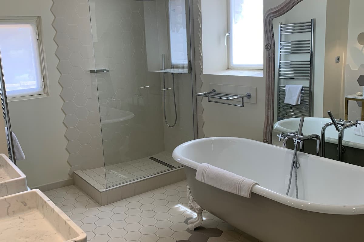 suite du mas | bathroom | designer toiletries, hair dryer, bathrobes, slippers