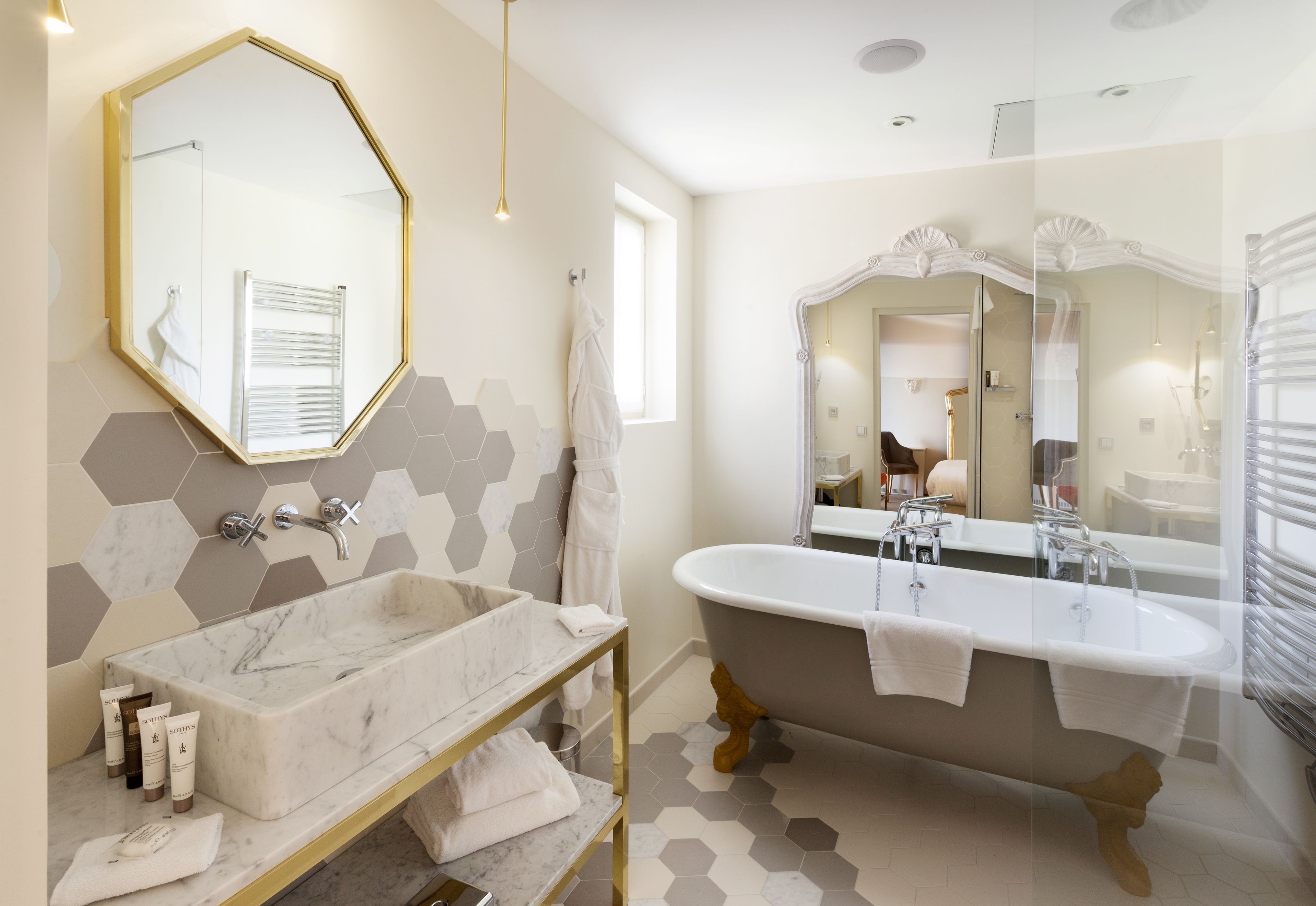 junior suite | bathroom | designer toiletries, hair dryer, bathrobes, slippers