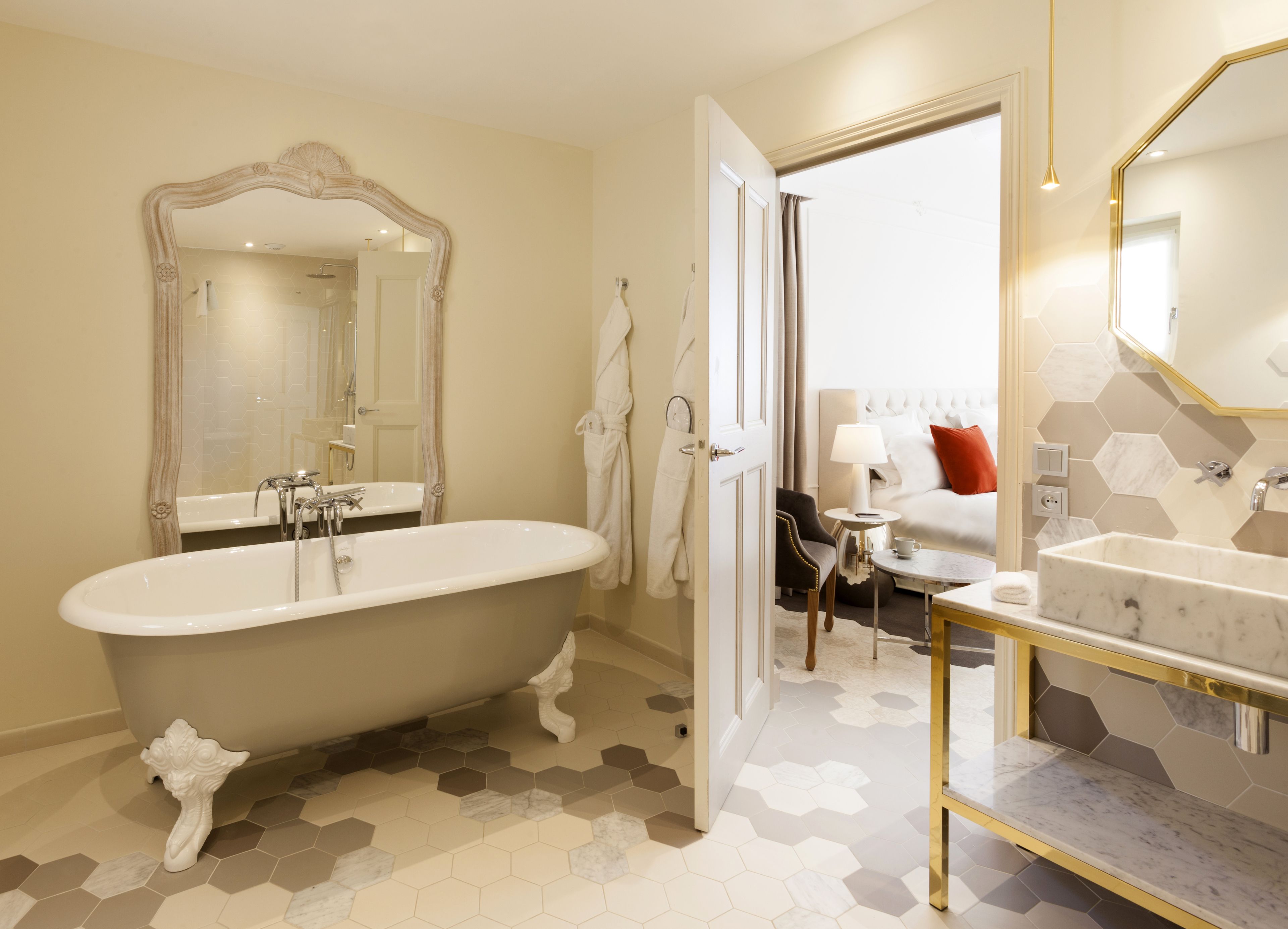 designer toiletries, hair dryer, bathrobes, slippers