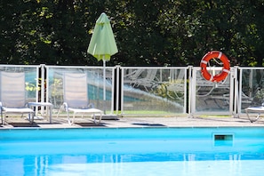 Outdoor pool, open 10:00 AM to 8:00 PM, pool umbrellas, sun loungers