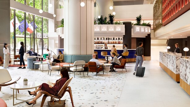 A spacious lobby with seating areas, a reception desk, and a bar. - Paris Marriott Rive Gauche Hotel & Conference Center (Paris)