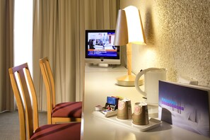 Premium bedding, free minibar, in-room safe, desk