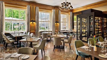 Breakfast, lunch, dinner served; international cuisine, garden views