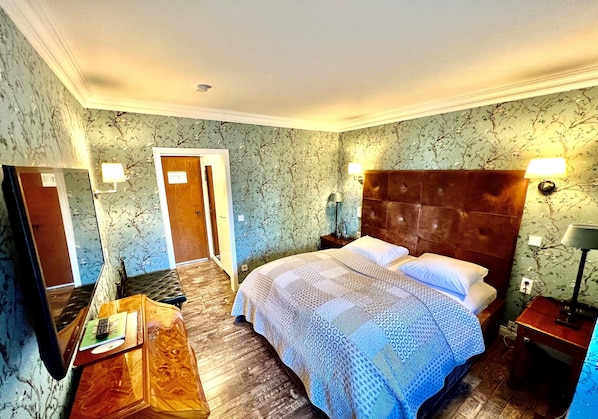 Individually decorated, individually furnished, desk, rollaway beds