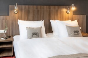 Literie hypoallergénique, coffres-forts dans les chambres, bureau