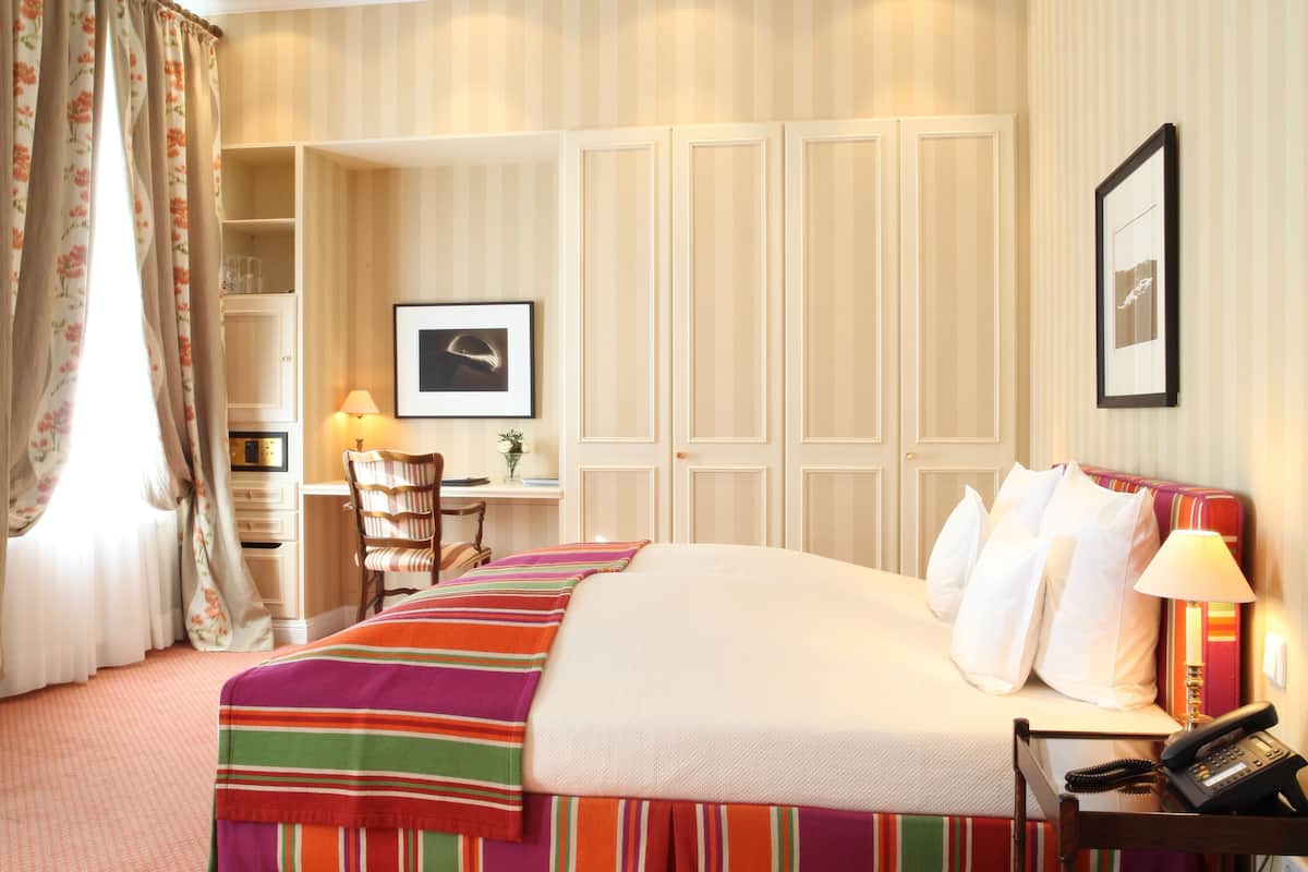 deluxe double room | premium bedding, down duvets, minibar, in-room safe