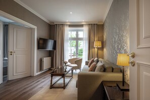 Suite | Living area | Flat-screen TV, DVD player