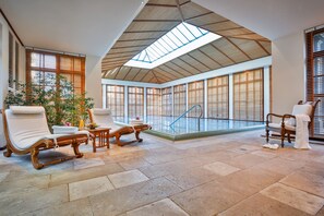 Indoor pool, sun loungers