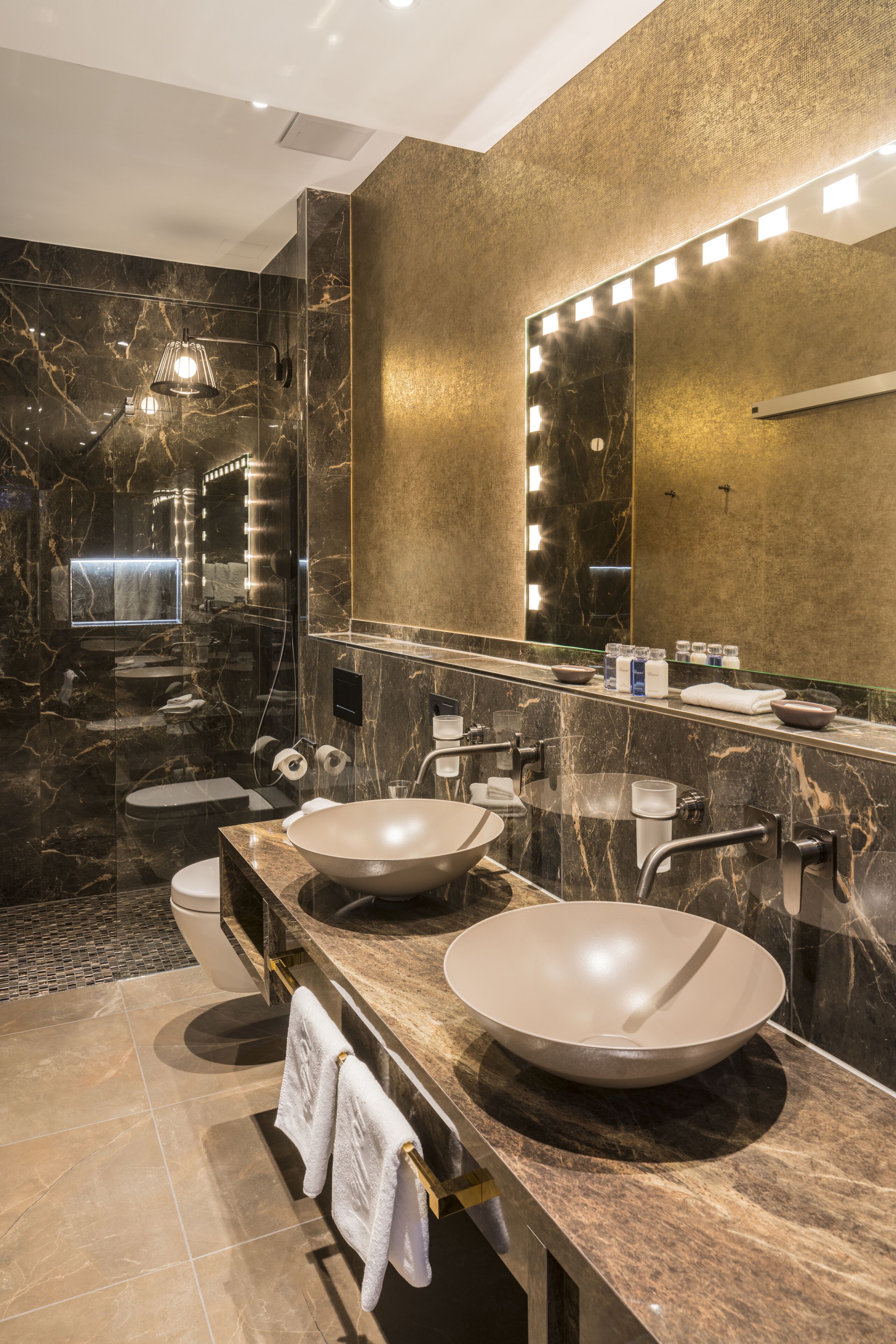 hair dryer, bathrobes, slippers, towels