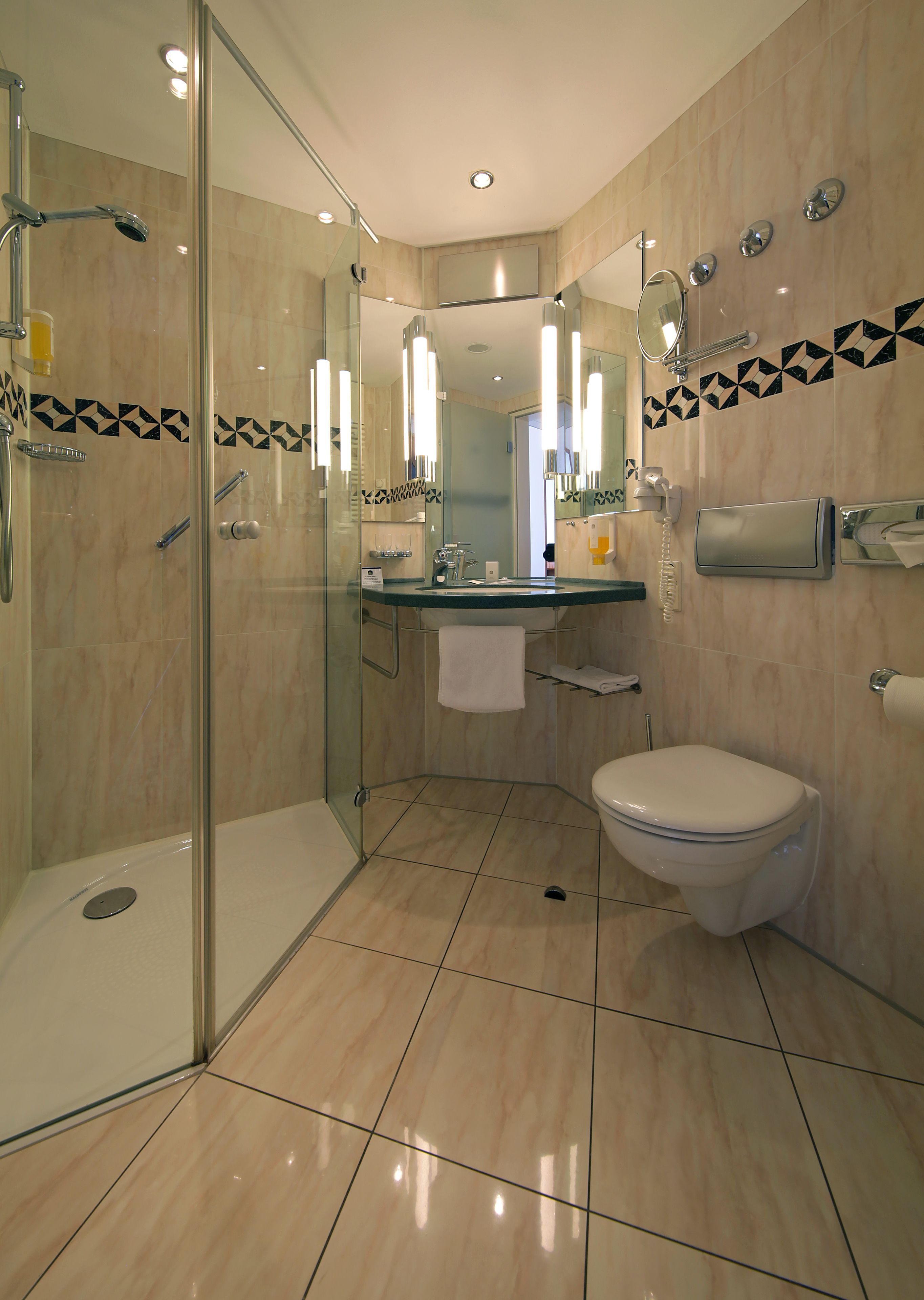 standard twin room, 1 double or 2 single beds | bathroom | eco-friendly toiletries, hair dryer, towels