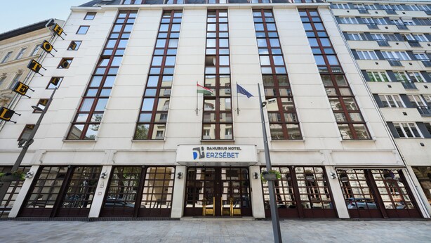 A hotel with a classic facade, large windows, and a sign indicating it is the Danubius Hotel Erszebet. - Hotel Erzsébet City Center Budapest, a member of Radisson Individuals (Budapest)