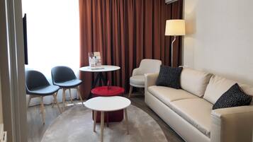 Suite Junior | Coffres-forts dans les chambres, rideaux occultants