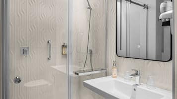 Eco-friendly toiletries, hair dryer, towels