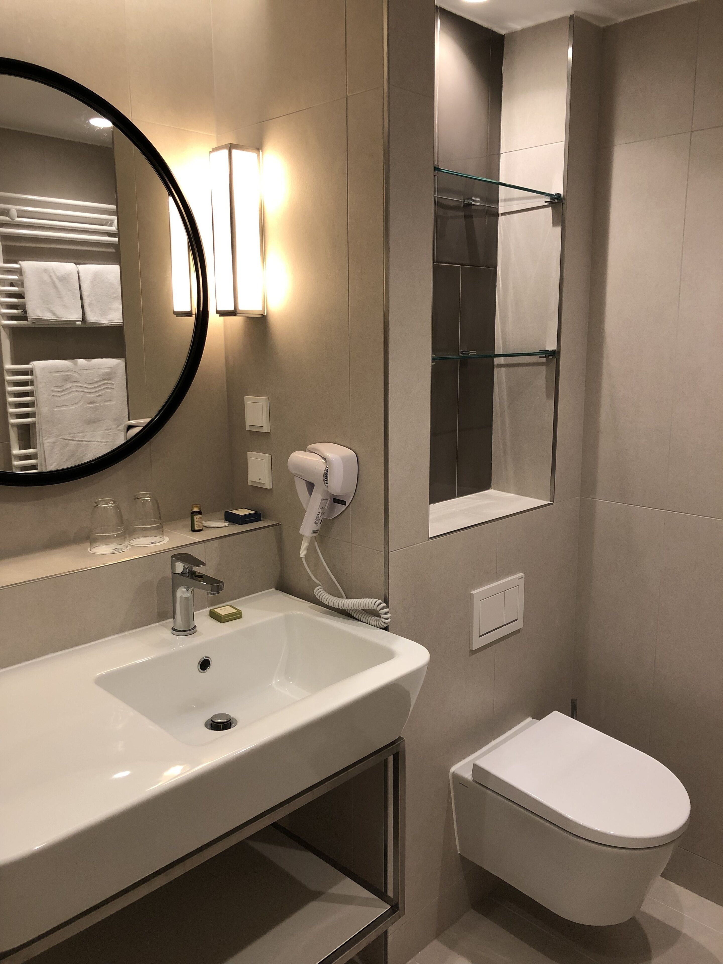 superior double room | bathroom | eco-friendly toiletries, hair dryer, towels