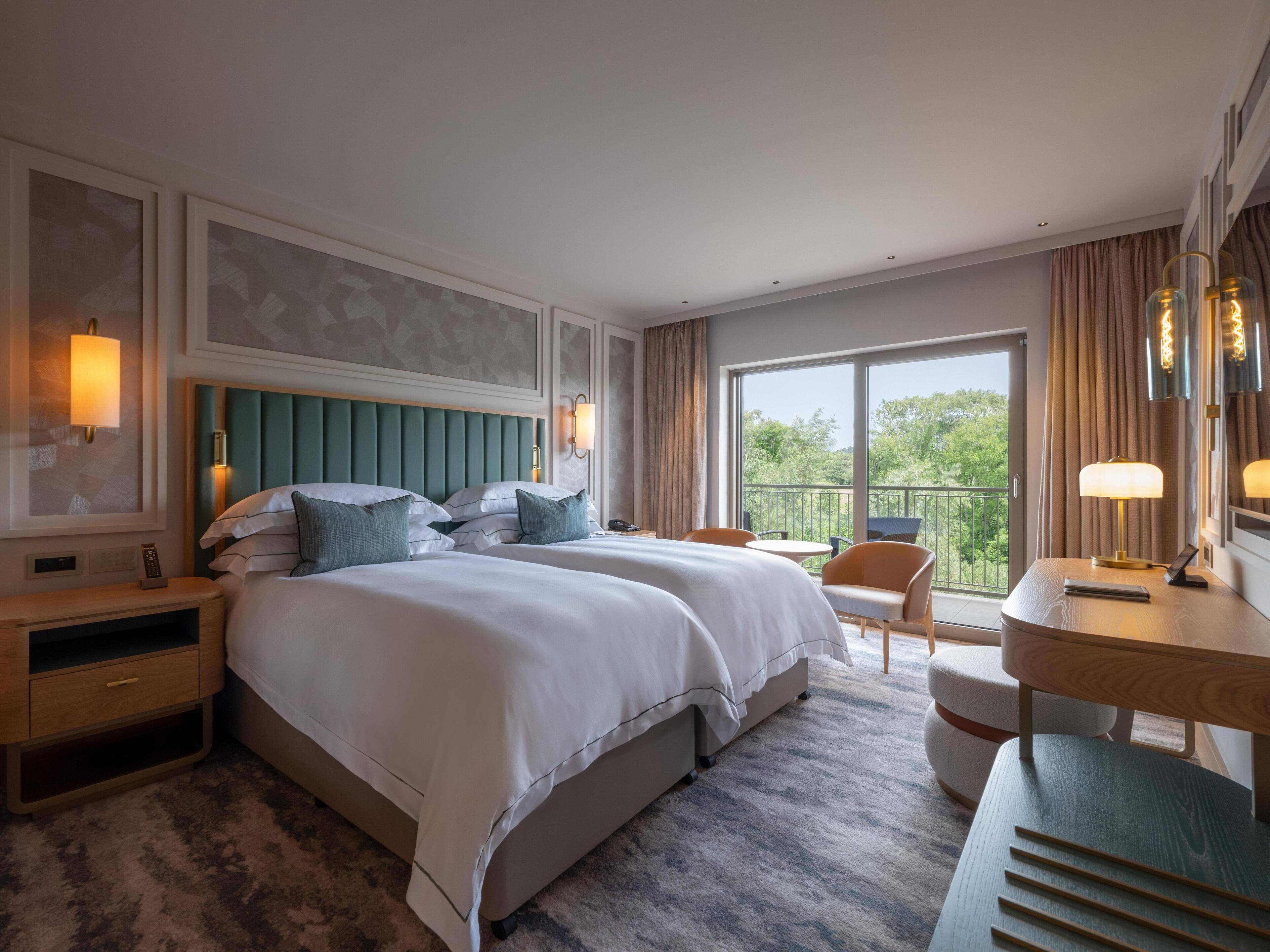 Golfside Twin Room | Minibar, in-room safe, desk, iron/ironing board