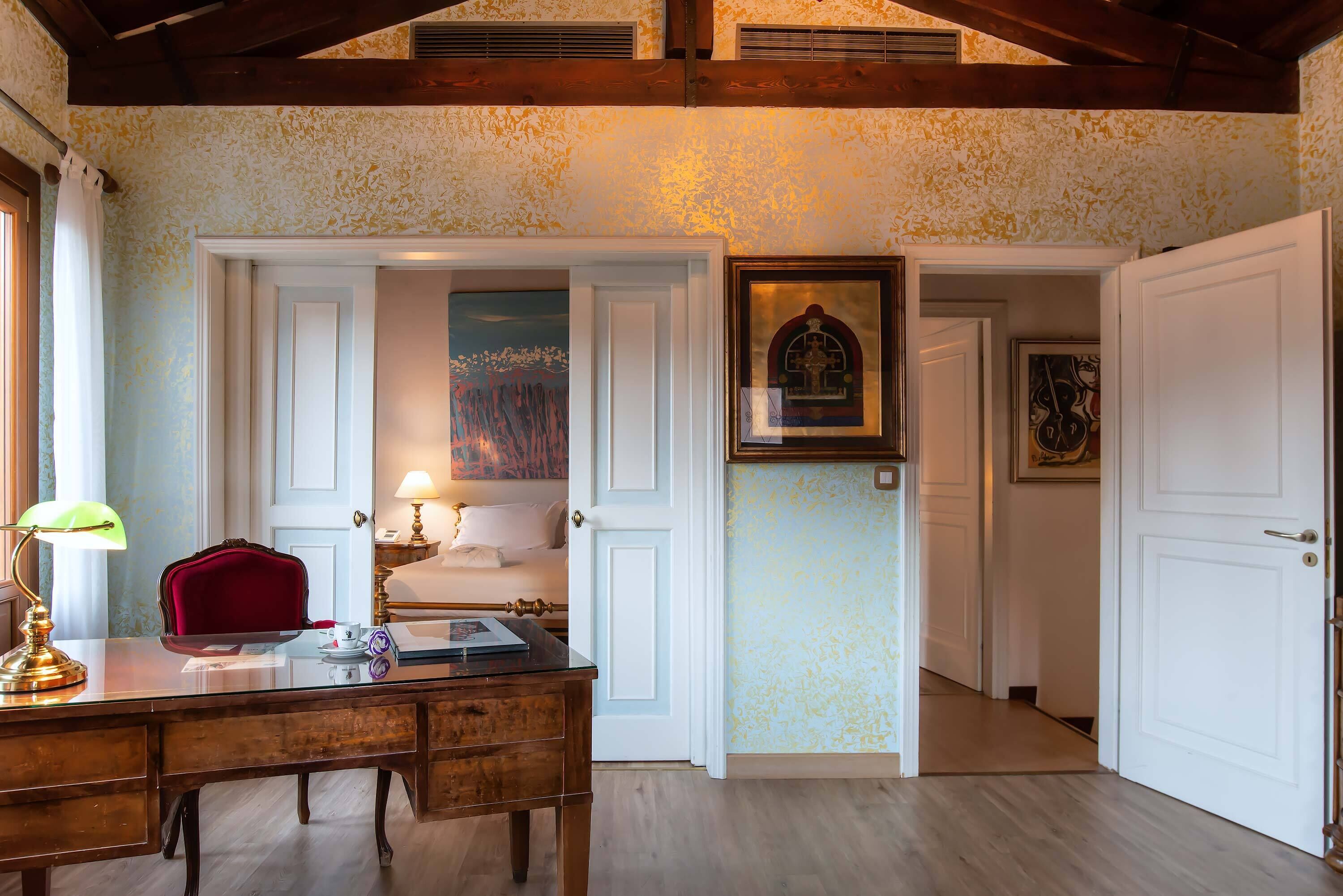 family suite, terrace | living area | flat-screen tv