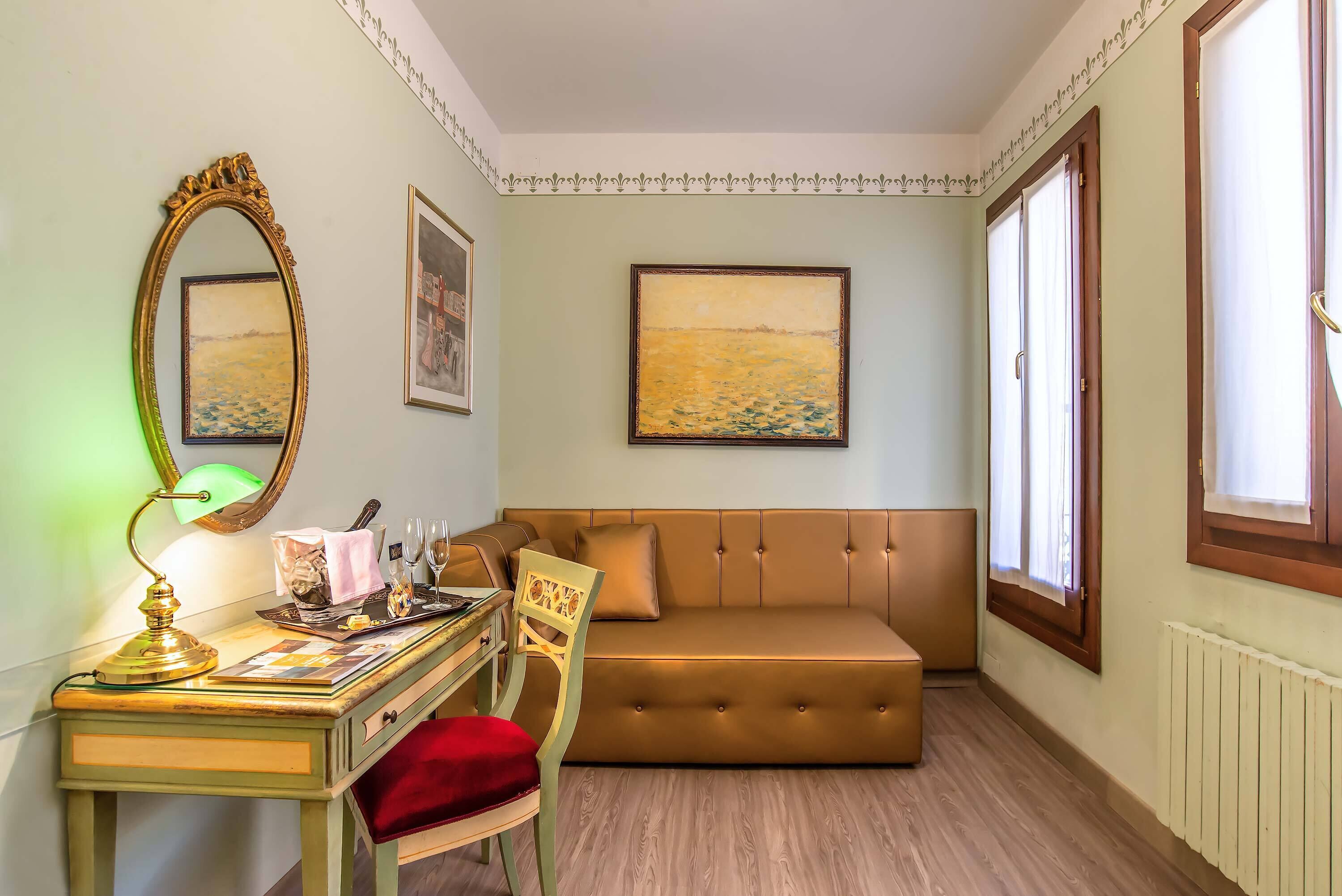 junior suite | living area | flat-screen tv